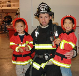 Michael loves pretending to be a firefighter.  It made his day to have a picture taken with a real fireman. 