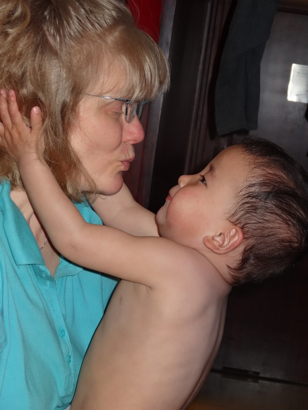 Max giving Mom a big kiss. 